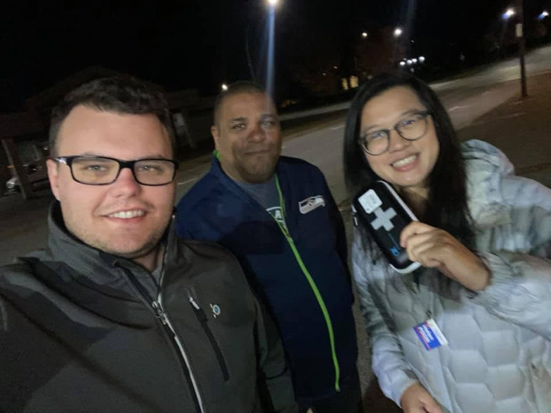 Tali Campbell outdoors at night with friends in Coquitlam.
