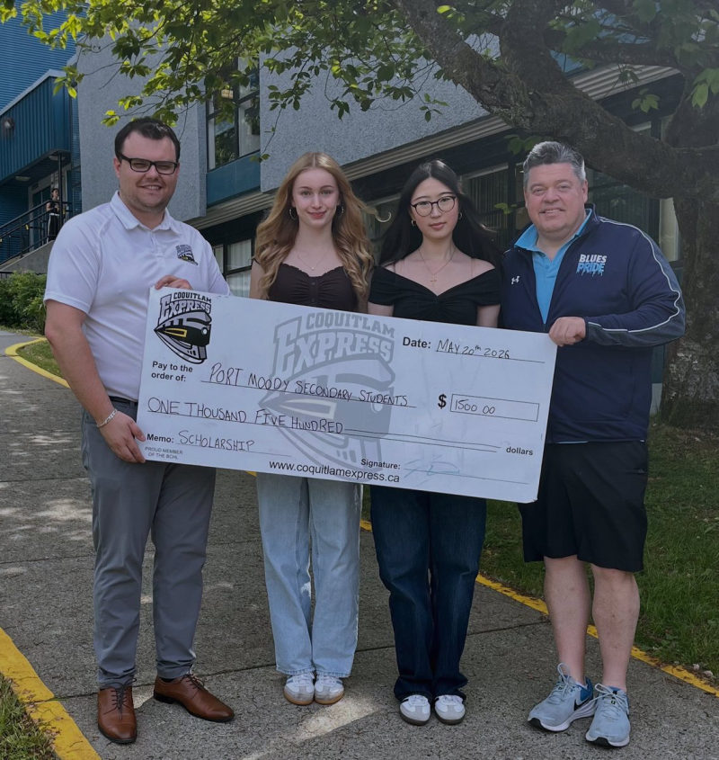 Tali Campbell with Port Moody Secondary students and partners holding a $1,500 Coquitlam Express scholarship cheque outdoors.